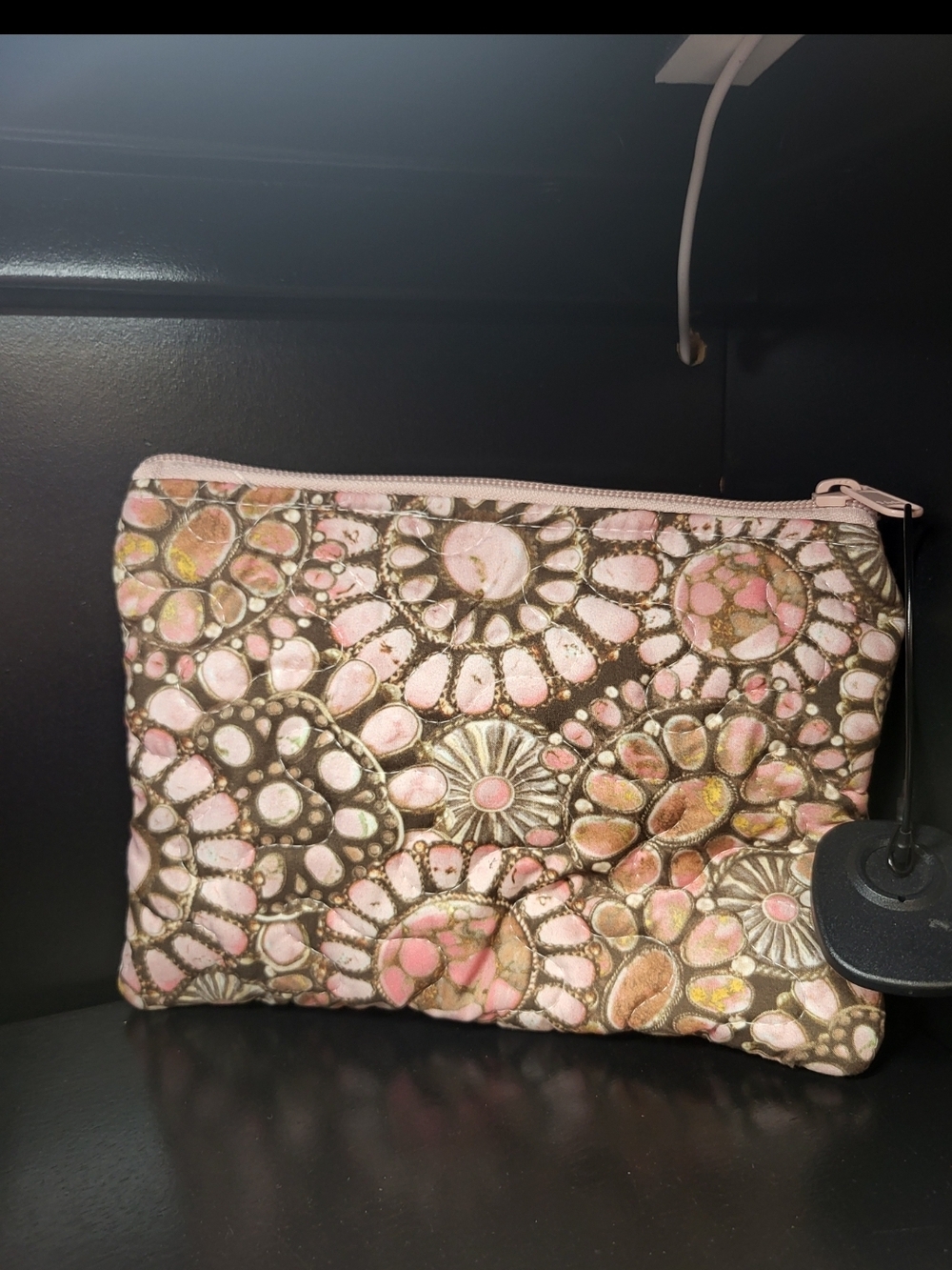 Pink Floral Embossed Cosmetic Pouch with Metallic Accents